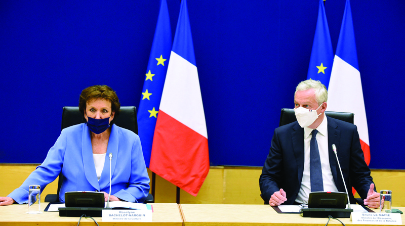 PARIS: French Economy and Finance Minister Bruno Le Maire (R) and Culture Minister Roselyne Bachelot (L) attend a meeting on providing financial help to the Cultural sector following the COVID-19 pandemic at the Economy ministry in Paris. - AFPn