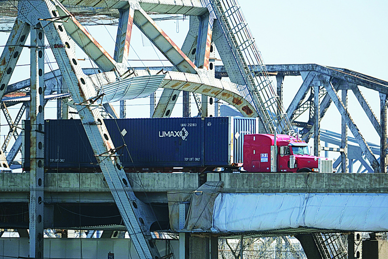 CINCINNATI: A truck drives across the Brent Spence Bridge on the Ohio-Kentucky border in Cincinnati, Ohio. - AFPn