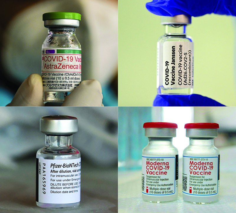 PARIS: This combination of file pictures shows  vials of the AstraZeneca vaccine,  Johnson & Johnson vaccine,  Moderna vials and Pfizer BioNtech vaccine.n