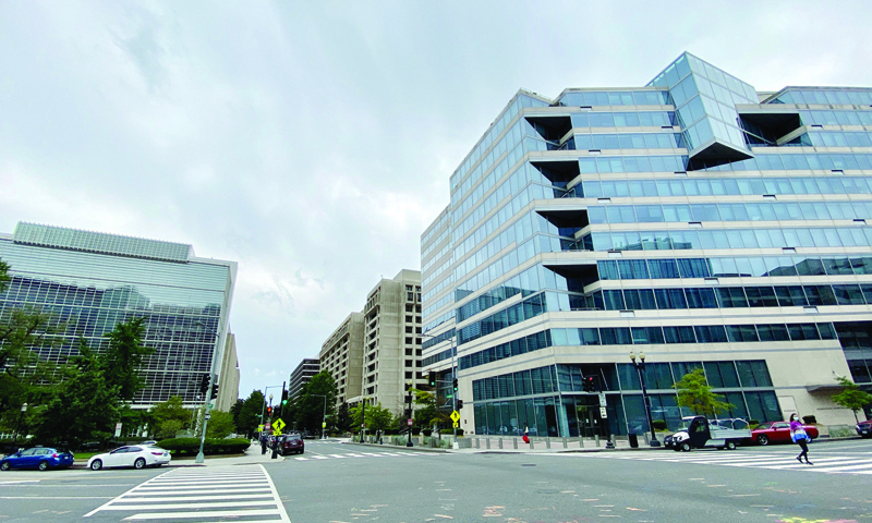 WASHINGTON: File photo shows a general view of the World Bank Group (WBG) building (L) and the International Monetary Fund (IMF) building (R) in Washington, DC on September 25, 2020. - AFPnnnn
