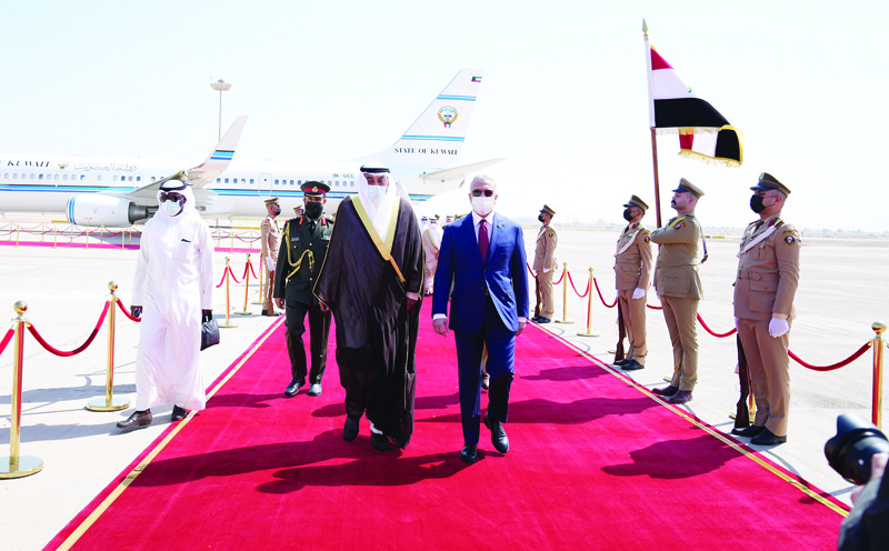 BAGHDAD: His Highness the Prime Minister Sheikh Sabah Khaled Al-Hamad Al-Sabah is being received by Iraqi Prime Minister Mustafa Al-Kadhemi on his arrival at Baghdad International Airport yesterday. KUNAn