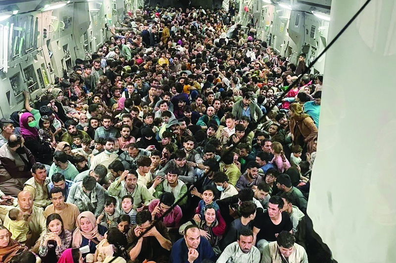 Image shows the inside of Reach 871, a US Air Force C-17 Globemaster III flown from Kabul to Qatar on Aug 15, 2021. The plane safely evacuated some 640 Afghans. - AFP n
