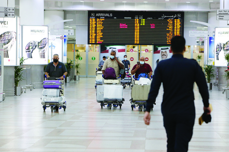 KUWAIT: Passengers arrive at the Kuwait International Airport in this file photo.-Photo by Yasser Al-Zayyatn