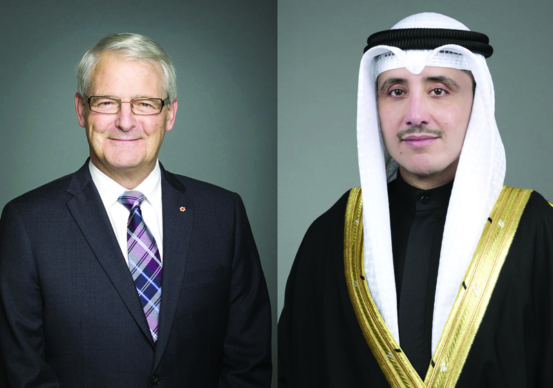 Canadian Foreign Minister Marc Garneau (left) and Kuwaiti Foreign Minister Sheikh Dr Ahmad Al-Sabah.n