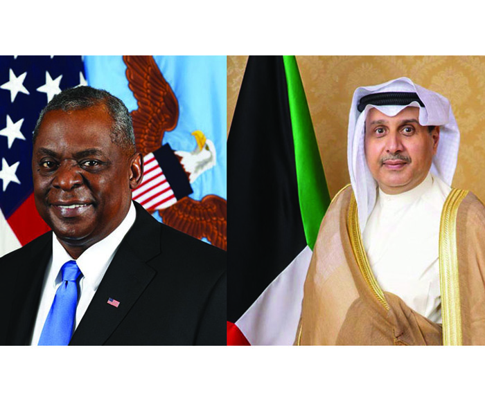 Kuwait's Defense Minister Sheikh Hamad Al-Sabah (right) and US Secretary of Defense Lloyd Austin.n