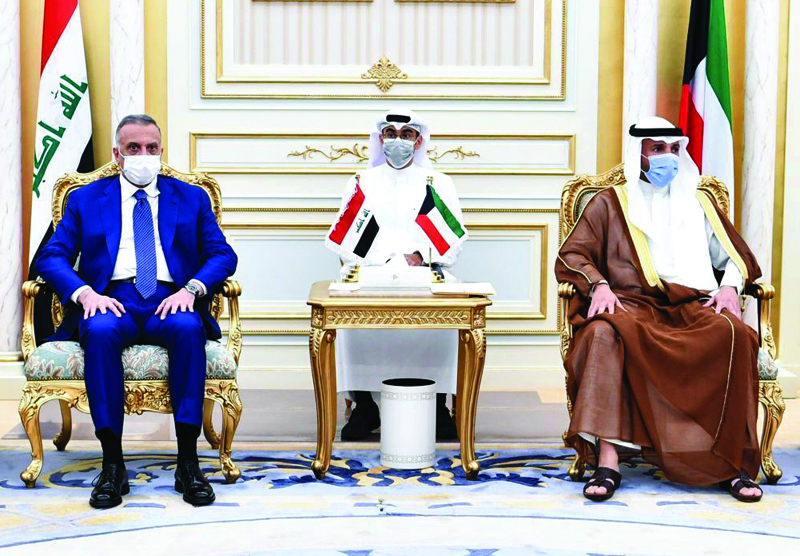 KUWAIT: National Assembly Speaker Marzouq Al-Ghanem meets Iraqi Prime Minister Mustafa Al-Kadhem. - KUNAn