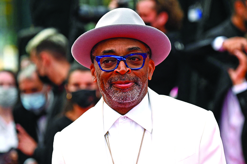 In this file photo US director and Jury President of the 74th Cannes Film Festival Spike Lee poses as he arrives for the screening of the film “The French Dispatch” at the 74th edition of the Cannes Film Festival in Cannes, southern France.—AFP n
