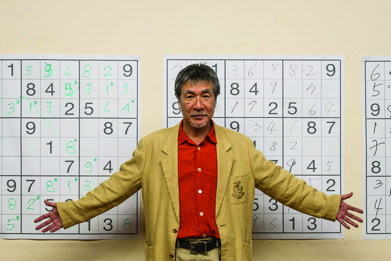 In this file photo Japanese puzzle manufacturer Maki Kaji poses for a picture during the first Sudoku national competition in Sao Paulo.—AFP n