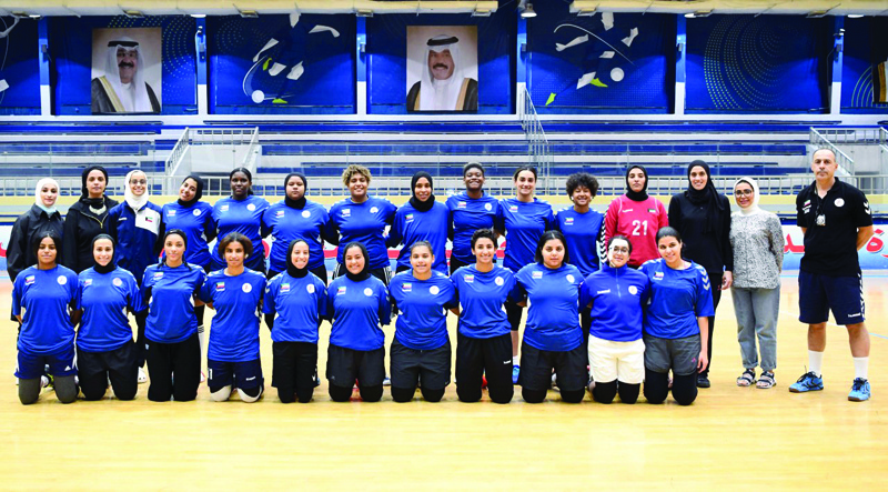 KUWAIT: Members of the Kuwait women's handball team, management and coaching staff. - KUNAn