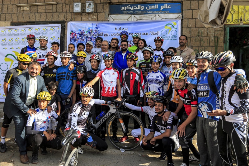 SANAA: Cyclists pose for a group photo ahead of a ride from the center of the Yemeni capital Sanaa yesterday bound for the northern Saada province about 320 kilometers (200 miles) away. - AFPn