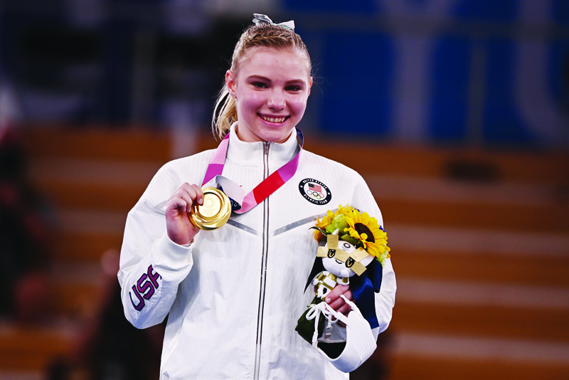 TOKYO: Gold medalist USA's Jade Carey poses during the podium ceremony of the artistic gymnastics women's floor exercise during the Tokyo 2020 Olympic Games at the Ariake Gymnastics Centre in Tokyo yesterday. - AFPn