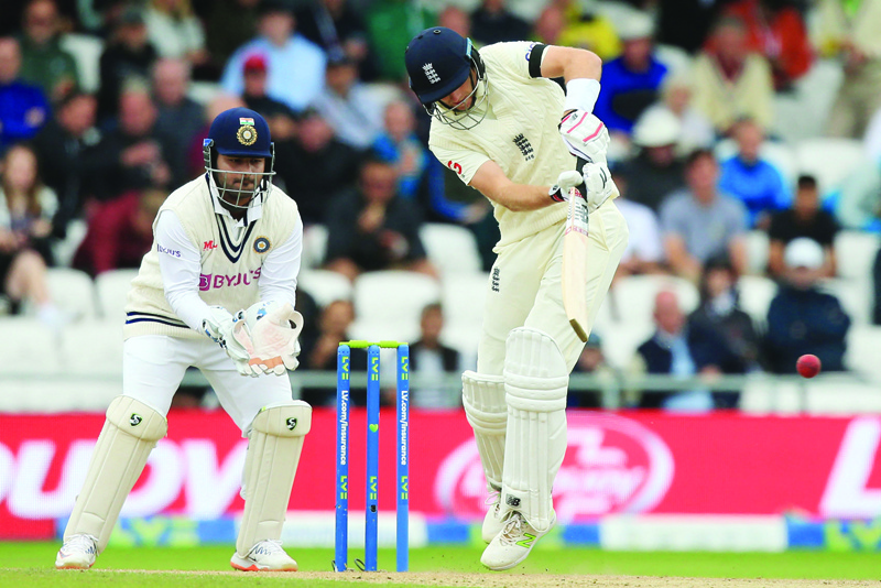 LEEDS: England's captain Joe Root plays a shot on the second day of the third cricket Test match between England and India at Headingley cricket ground in Leeds, northern England, yesterday. - AFPn