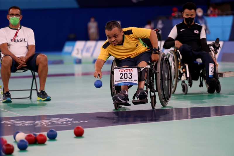 TOKYO: Brazil's Maciel Santos (center) competes with South Korea's Lee Yong-jin (not pictured) in the boccia individual BC2 class during the Tokyo 2020 Paralympic Games at Ariake Gymnastics Centre in Tokyo on Saturday. – AFPn