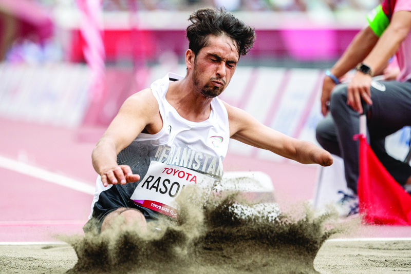 TOKYO: Afghanistan's Hossain Rasouli competes in the final of the men's long jump -T47 at the Tokyo 2020 Paralympic Games at the Olympic Stadium in Tokyo yesterday. - AFPn