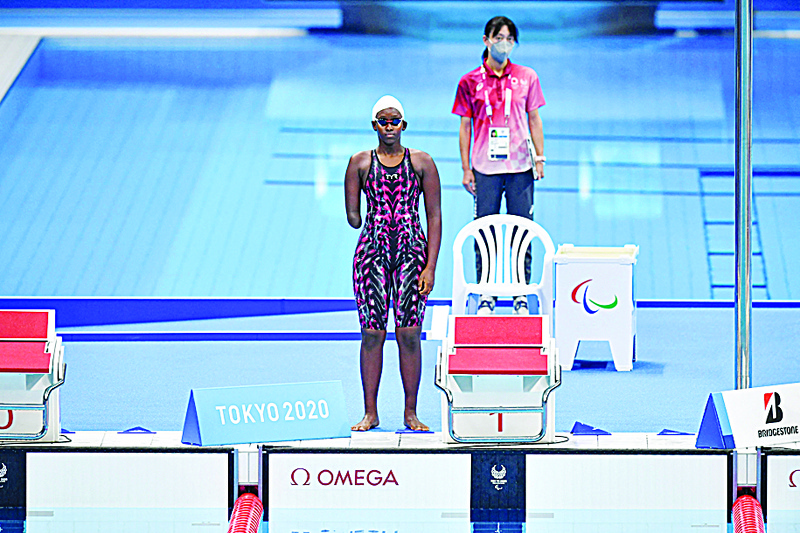 TOKYO: Uganda's Husnah Kukundakwe attends a heat in the women's 100m breaststroke at the Tokyo 2020 Paralympic Games in the Tokyo Aquatics Centre in Tokyo yesterday. - AFPn