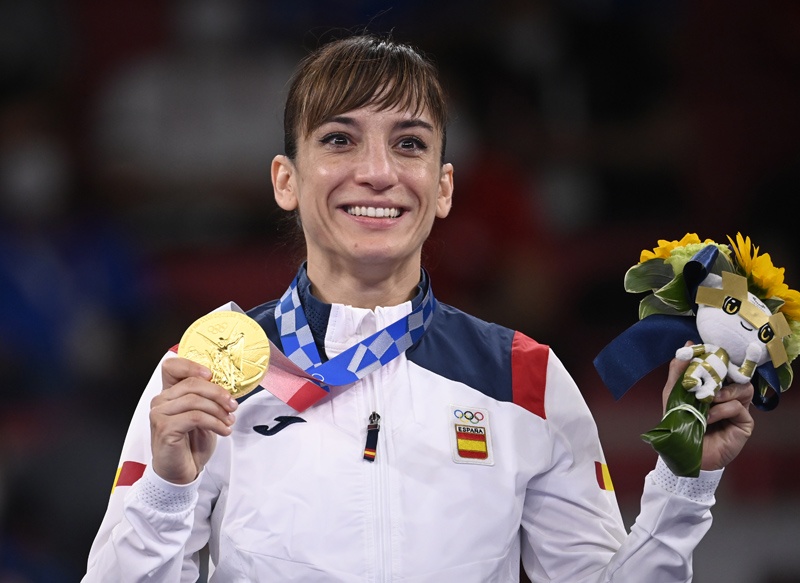 TOKYO: Spain's Sandra Sanchez Jaime poses with her women's kata gold medal in the karate competition of the Tokyo 2020 Olympic Games at the Nippon Budokan in Tokyo yesterday. - AFPn