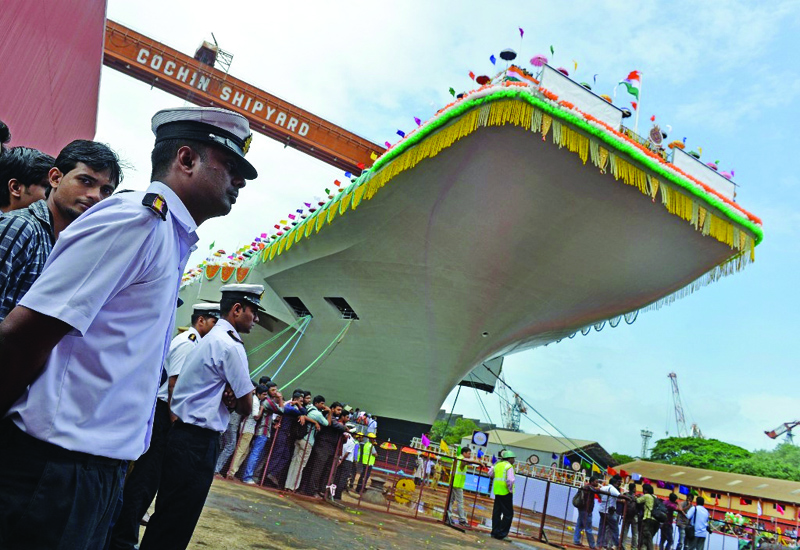 COCHIN: In this file photo, Indian naval officers stand guard during the launch of the indigenously-built aircraft carrier INS Vikrant at the Cochin Shipyard in Kochi. - AFPn