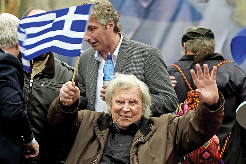In this file photo Greek composer Mikis Theodorakis gestures during a demonstration to urge the government not to compromise in the festering name row with neighboring Macedonia, at the Syntagma Square in Athens. — AFP photos