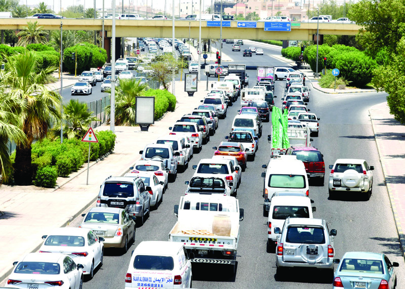 KUWAIT: Heavy traffic at the intersection between Road 55 and the Fourth Ring Road yesterday. - Photo by Fouad Al-Shaikh (To have your picture featured in the Kuwait Times' 'Photo of the Day' section, please send your high resolution, unedited photos to local@kuwaittimes.com, along with the full name and Instagram account, in addition to a description showing the picture's location and date taken)n
