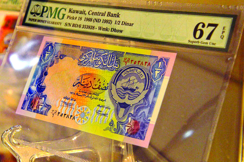 An important part of any society is the preservation of historical spaces, buildings and artifacts. Some of Kuwait's most interesting historical artificats are newspapers, books, other printed materials and old bank notes. Here is displayed a half dinar note from the late 1960s. - Photo by Kunan