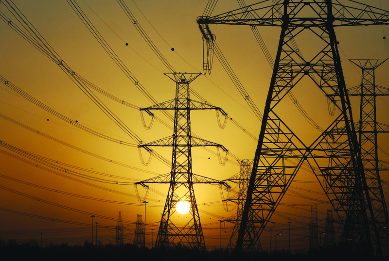 KUWAIT: The sun sets behind transmission towers in Kuwait City yesterday. - Photo by Yasser Al-Zayyat (To have your picture featured in the Kuwait Times' 'Photo of the Day' section, please send your high resolution, unedited photos to local@kuwaittimes.com, along with the full name and Instagram account, in addition to a description showing the picture's location and date taken)n