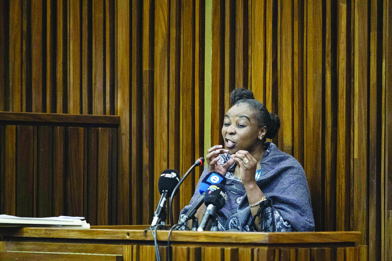 JOHANNESBURG: Nomia Rosemary Ndlovu reacts at the South Gauteng high Court in Johannesburg yesterday. – AFP n