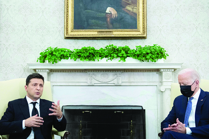 WASHINGTON: US President Joe Biden listens while Ukraine’s President Volodymyr Zelensky speaks to the press before a meeting in the Oval Office of the White House September 1, 2021, in Washington, DC. — AFP