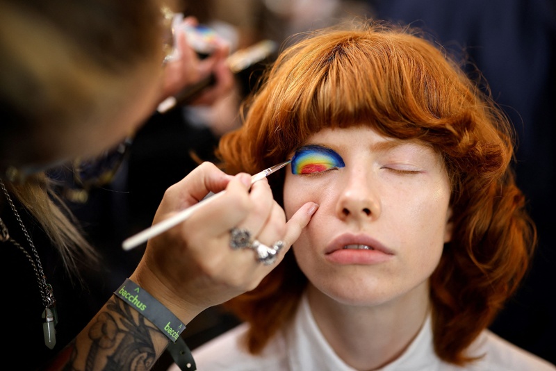 File photos shows models are prepared backstage ahead of the catwalk show from Paul & Joe, founded by French designer Sophie Mechaly, ahead of the catwalk show for their Spring/Summer 2022 collection on the fourth day of London Fashion Week in London.—AFP  n
