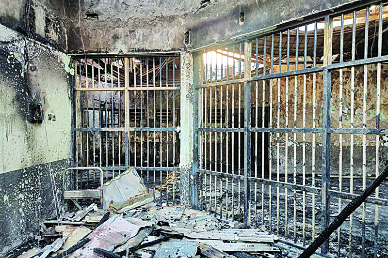 TANGERANG: This handout picture taken and released by the Indonesian Ministry of Law and Human Rights shows a prison in Tangerang, after a fire broke out and killed 41 inmates. - AFP  n