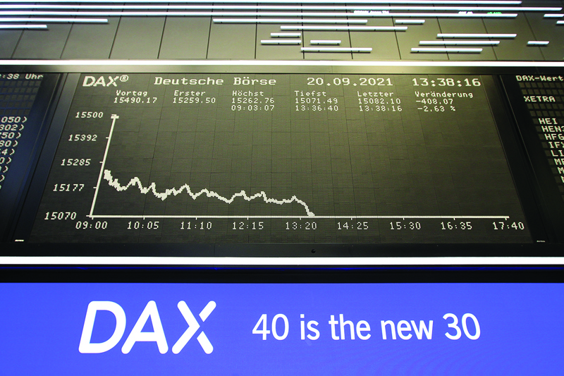 FRANKFURT, Germany: A display showing the chart of Germany's share index DAX is pictured at the stock exchange in Frankfurt am Main, western Germany, yesterday.-AFPn