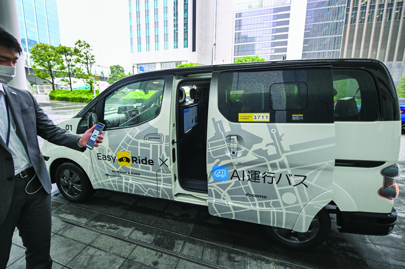 YOKOHAMA: A Nissan Motor autonomous vehicle during a press preview for a field operation test of Easy Ride at the Minato Mirai business district in Yokohama. - AFPnn