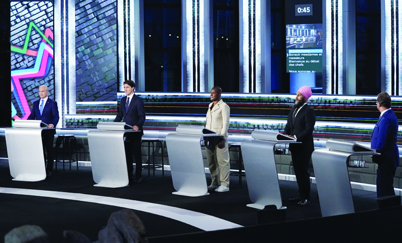 GATINEAU, Canada: In this file photo (from left) Conservative leader Erin O'Toole, Canadian Prime Minister and Liberal leader Justin Trudeau, Green leader Annammie Paul, New Democratic Party leader Jagmeet Singh and Bloc Quebecois leader Yves-Francois Blanchet stand at their podiums before the federal election.-AFPn