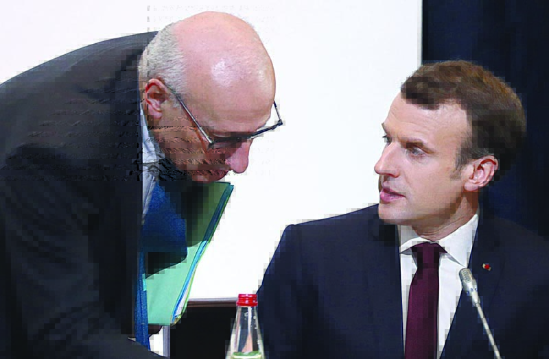 PARIS:  French President Emmanuel Macron (right) speaks with presidential diplomatic advisor as they take part in the Cedre conference at The Foreign Affairs Ministry in Paris. France has recalled its ambassadors to US, Philippe Etienne, and Australia, Jean-Pierre Thebault, for consultations in a ferocious row over the scrapping of a submarine contract.- AFP n