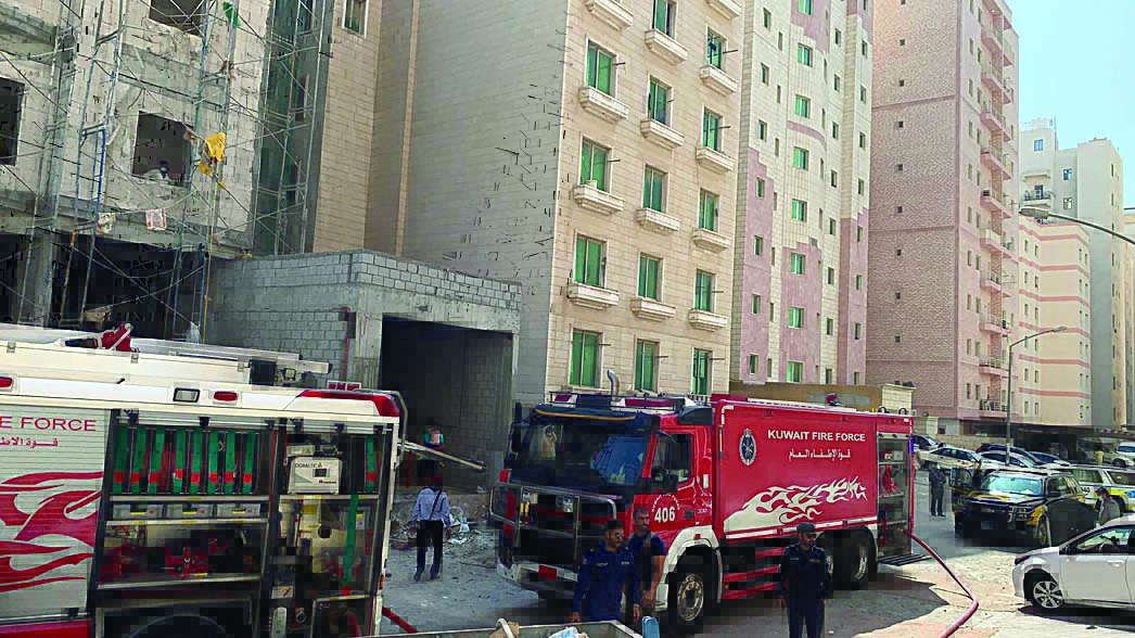 KUWAIT: This handout photo released by Kuwait Fire Force shows a fire engine at the site of a blaze reported in Salmiya yesterday.n
