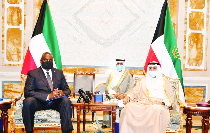 KUWAIT: HH the Amir Sheikh Nawaf Al-Ahmad Al-Jaber Al-Sabah receives US Secretary of Defense Lloyd Austin at Bayan Palace yesterday. - AFP n