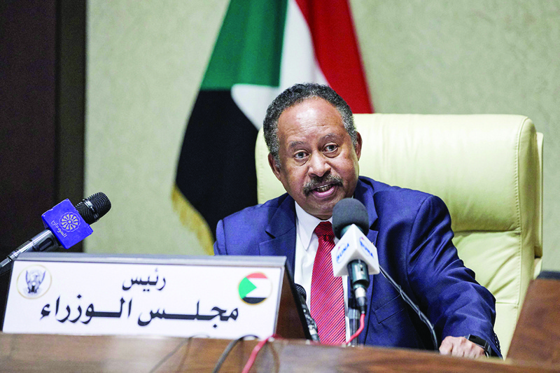 KHARTOUM: Sudan's Prime Minister Abdalla Hamdok chairs a cabinet meeting in the capital yesterday. - AFP n