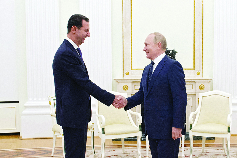 MOSCOW: Russian President Vladimir Putin meets Syrian President Bashar Al-Assad at the Kremlin on Monday. – AFP n