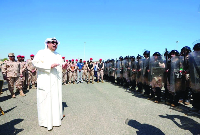 KUWAIT: Defense Minister Sheikh Hamad Jaber Al-Ali Al-Sabah speaks to Military Police personnel during the visit. - Defense Ministry photon