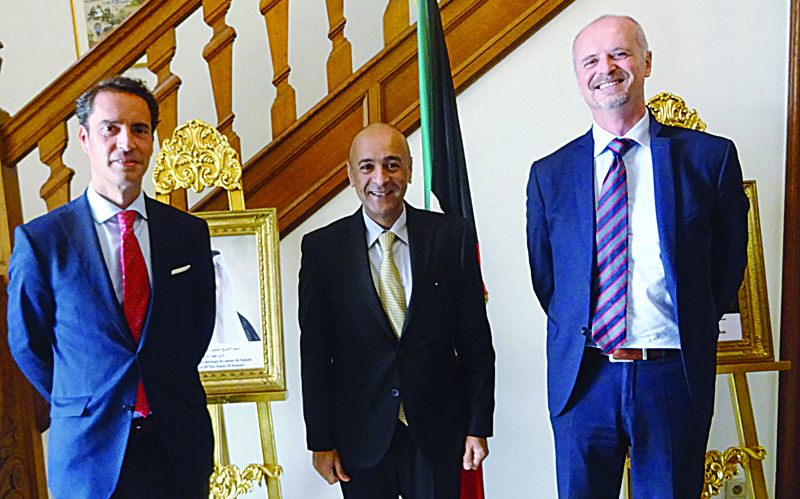 BRUSSELS: Kuwait's Ambassador to NATO Jasem Al-Budaiwi (center) with NATO officials Giovanni Romani (right) and Javier Colomina. - KUNAn