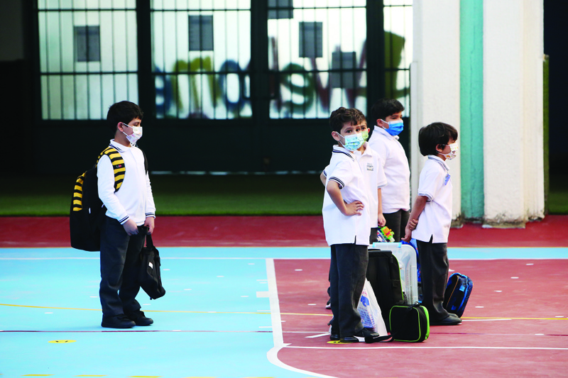 KUWAIT: Students arrive to school as in-person classes resume in Kuwait yesterday. - Photos by Yasser Al-Zayyatn