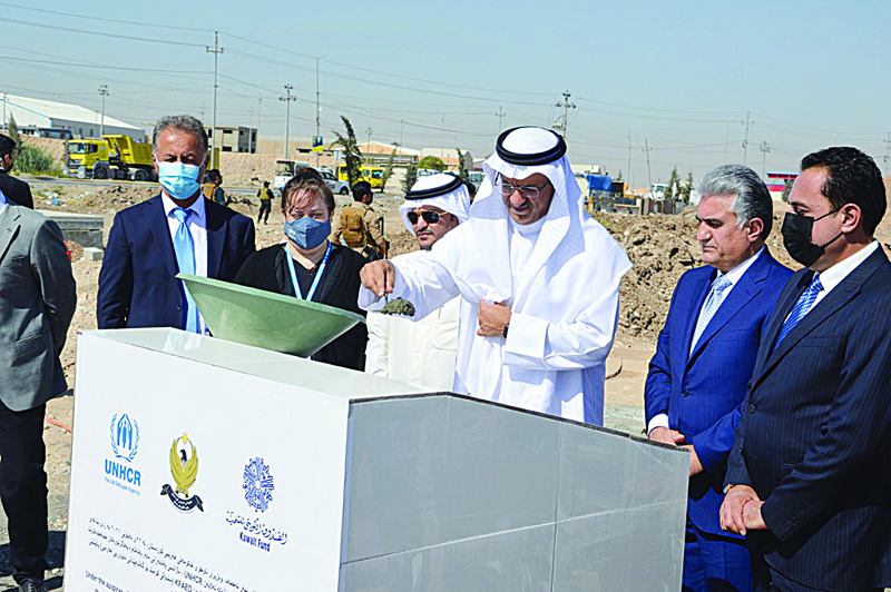 IRBIL: Consul General of Kuwait in Irbil Dr Omar Al-Kandari lays the foundation stone of a center for registration of refugees and IDPs in Irbil Governorate, Kurdistan Region, North Iraq, yesterday. - KUNAn