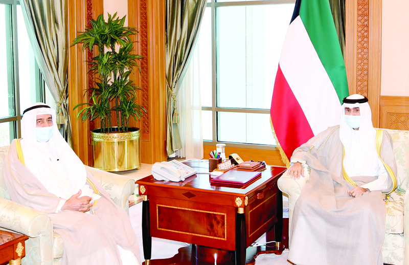 KUWAIT: His Highness the Amir Sheikh Nawaf Al-Ahmad Al-Jaber Al-Sabah meets Chairman of the Supreme Judicial Council and the Court of Cassation Justice Ahmad Al-Ajeel. - KUNAn