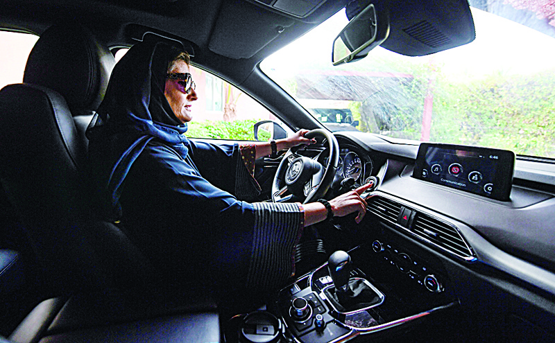 JEDDAH: In this file photo, Hala Hussein Alireza, a newly-licensed Saudi motorist, drives a car in the Red Sea coastal city of Jeddah. - AFP n