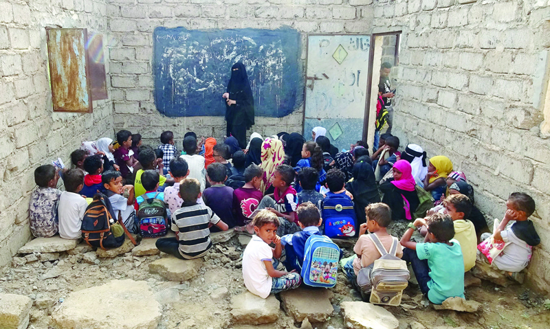 HODEIDAH, Yemen: Displaced Yemeni children attend class in a dilapidated school building, in the war-torn western province of Hodeidah. Many schools in Yemen have been destroyed in the conflict between the government and the Houthi rebels or turned into refugee camps or military facilities. - AFP n