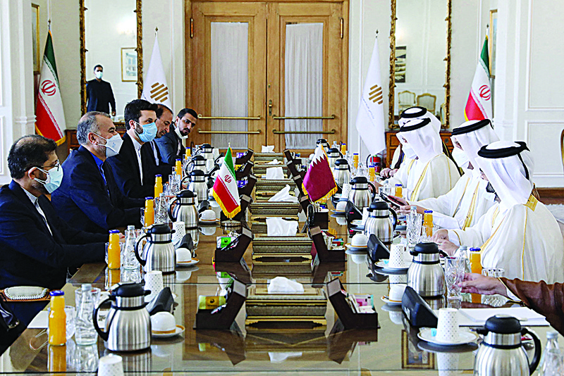 TEHRAN: This handout picture shows Iran's Foreign Minister Hossein Amir Abdollahian (2nd left) meeting with Qatari Deputy Prime Minister and Foreign Minister Mohammed bin Abdulrahman Al Thani (2nd right) in the capital Tehran.- AFP n
