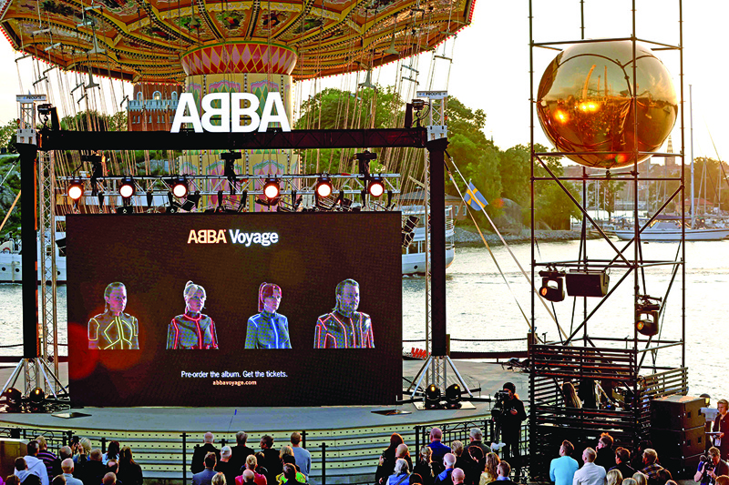 Members of the Swedish group ABBA are seen on a display during their Voyage event at Grona Lund, Stockholm, during their presentation of the first new song after nearly four decades.—AFP n