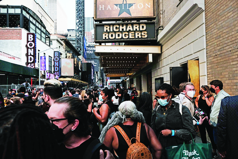 Fans, media and cast members gather outside the Richard Rodgers Theatre where the musical “Hamilton” is being prepared for opening for the first time since March 2020 when it was closed due to the COVID-19 pandemic in New York City.—AFP n
