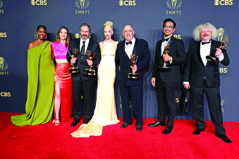 (From left to right) Moses Ingram, Marielle Heller, Scott Frank, Anya Taylor-Joy, William Horberg, Mick Aniceto, and Marcus Loges, winners of the Outstanding Limited Or Anthology Series award for ‘The Queen’s Gambit,’ pose in the press room during the 73rd Primetime Emmy Awards at L.A. LIVE in Los Angeles, California.—AFP photosn