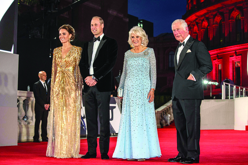 Britain’s Prince William, Duke of Cambridge (second left) and Britain’s Catherine, Duchess of Cambridge (left) stand with Britain’s Prince Charles, Prince of Wales (right) and Britain’s Camilla, Duchess of Cornwall as they arrive for the World Premiere of the James Bond 007 film “No Time to Die” at the Royal Albert Hall in west London.—AFP photosn