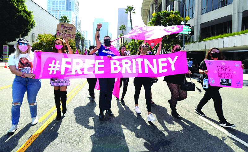 Fans of Britney Spears protest in front of the Stanley Mosk Courthouse during Britney's hearing to end her father's controversial guardianship, in Los Angeles, California.—AFP n